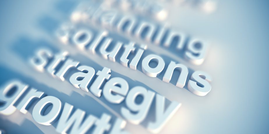 Developing a transformational organisation level technology strategy to move an organisation from a closed innovation model to a more open innovation model.